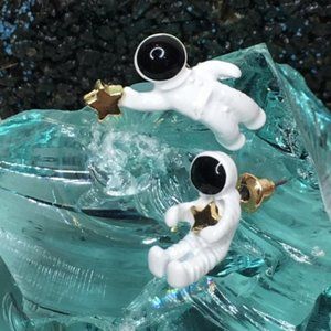 Made of plastic but they have the appearance of cracked glass style. Brand New.